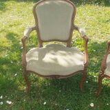 Pair of Rocaille style armchairs in green fabric and walnut, 19th century