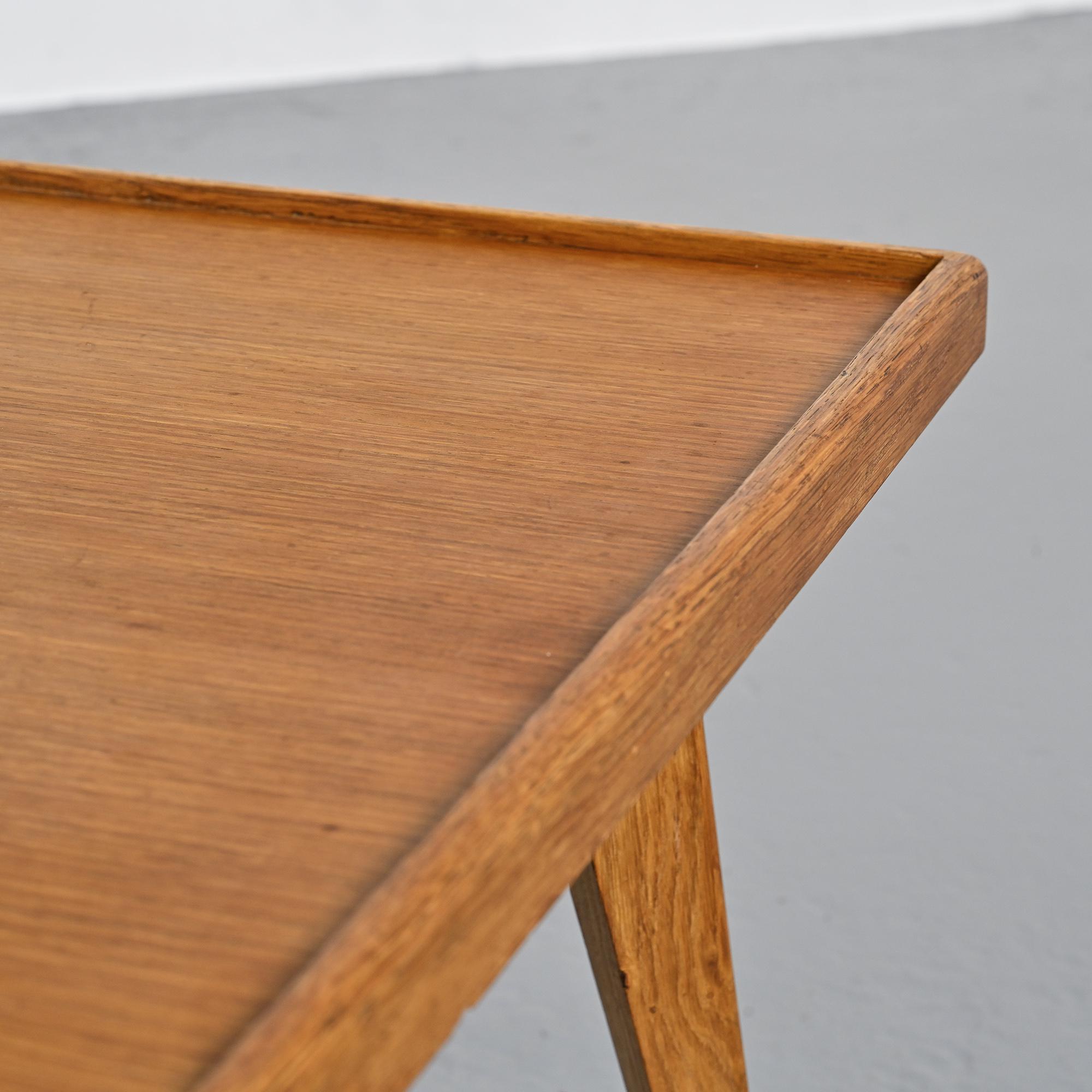 Coffee table with tapered legs, France, circa 1950-1960.