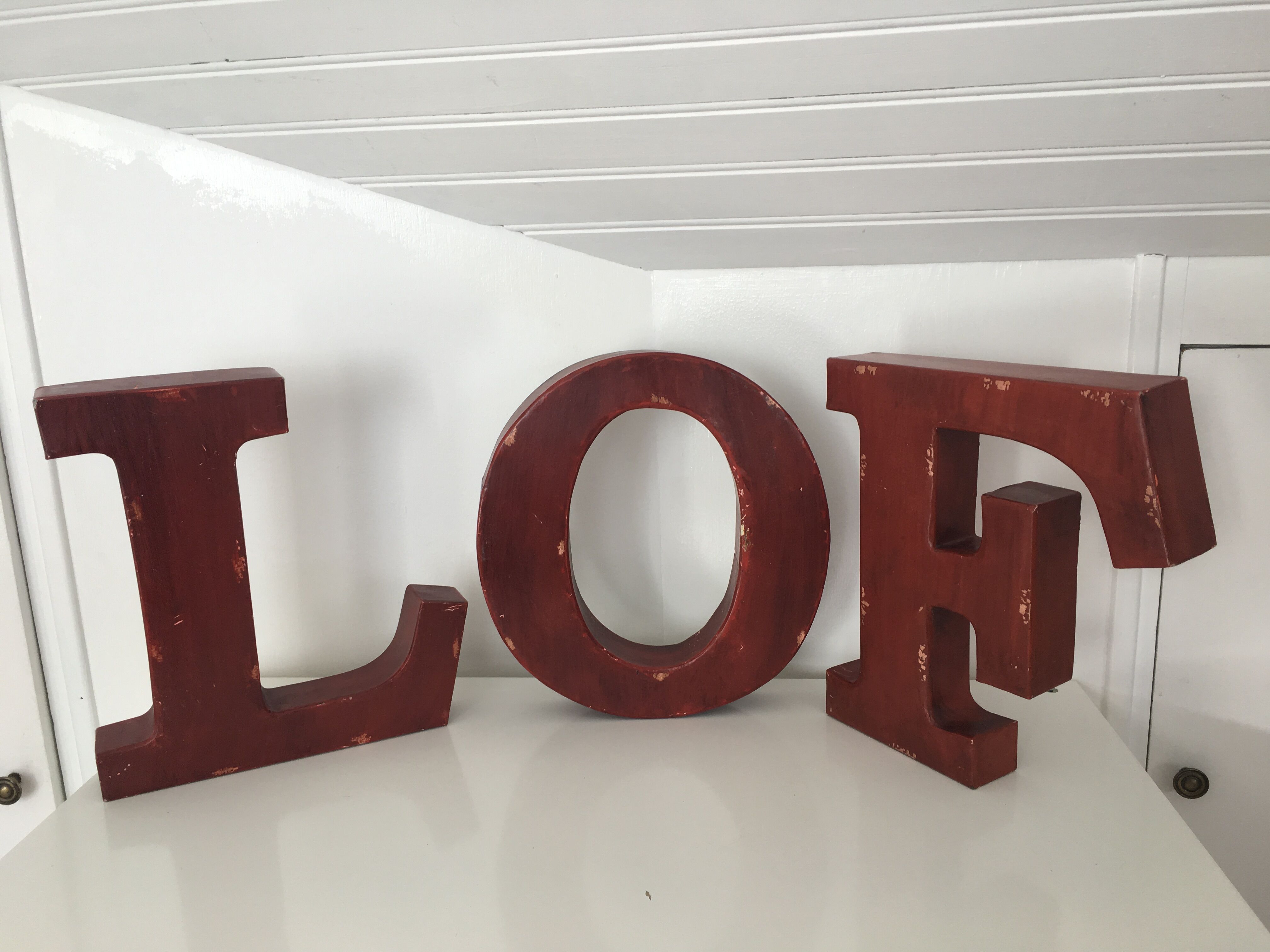 Red metal "F" sign letter