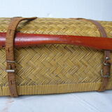 Old rattan case with leather straps and wooden handle