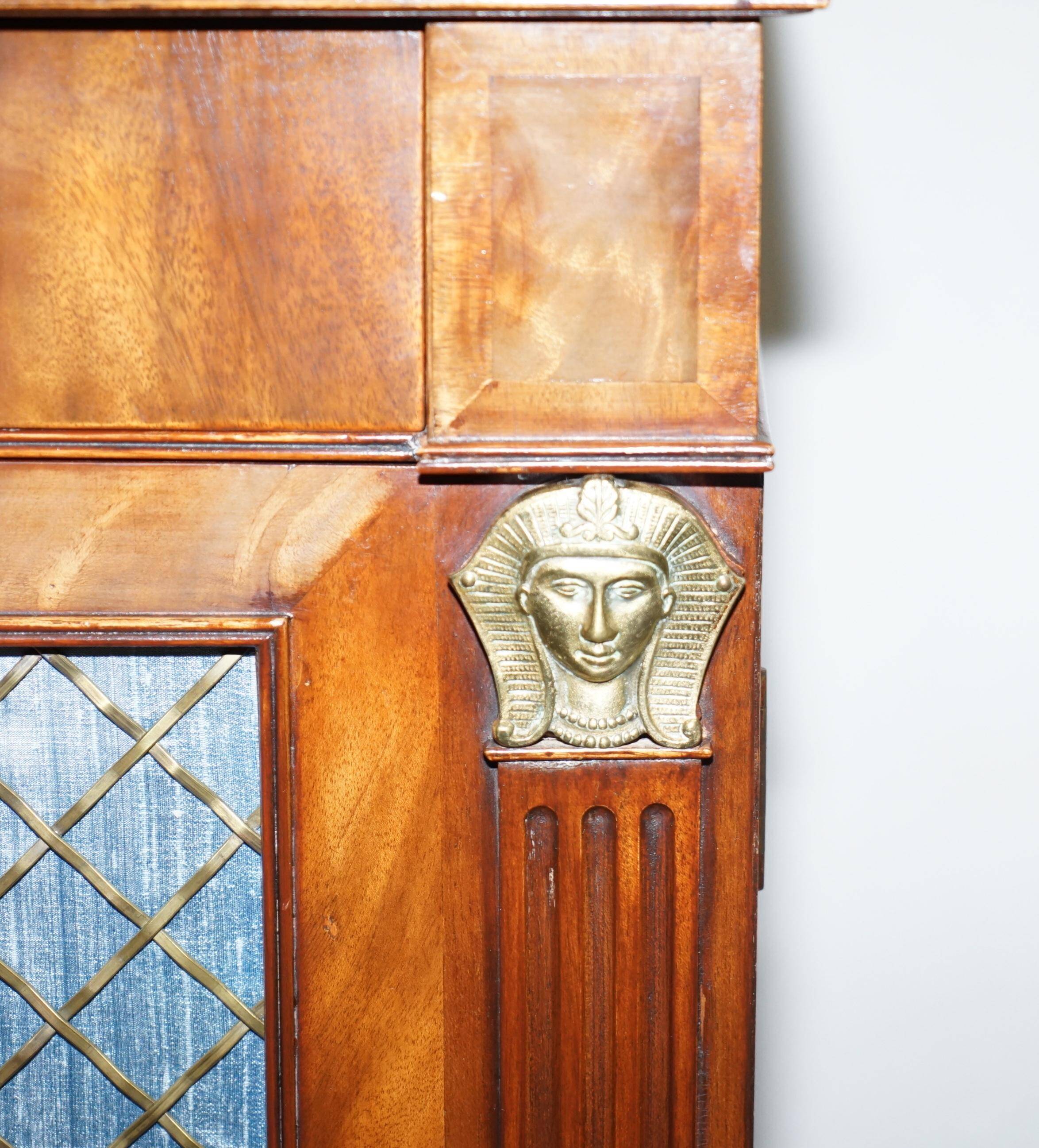 Antique buffet circa 1900 in hardwood and gilded bronze, Egyptian Revival style.