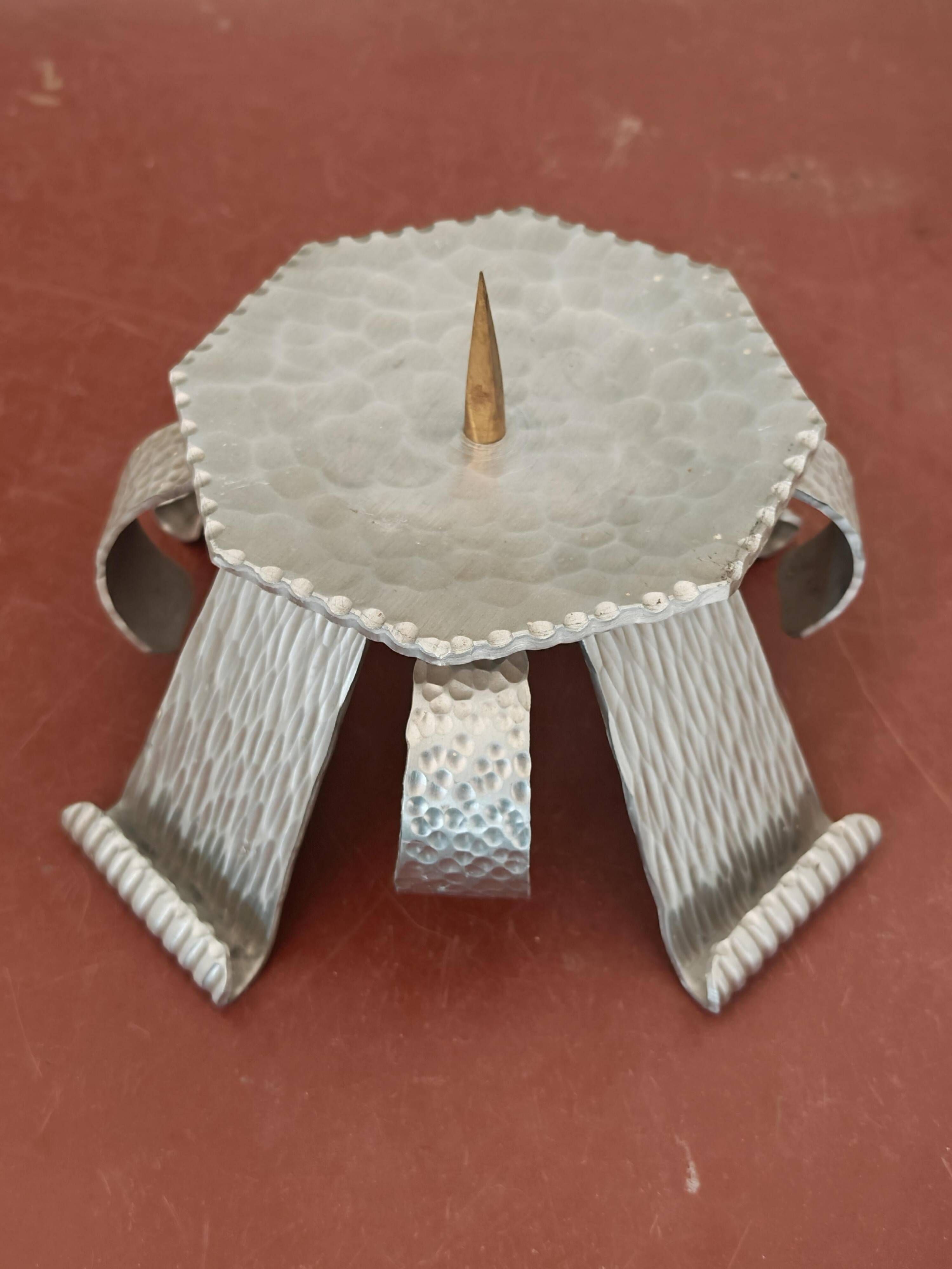 Pair of brutalist hammered aluminium candlesticks, 1970s