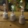 Set of 3 antique pewter bottles with cut glass stoppers.