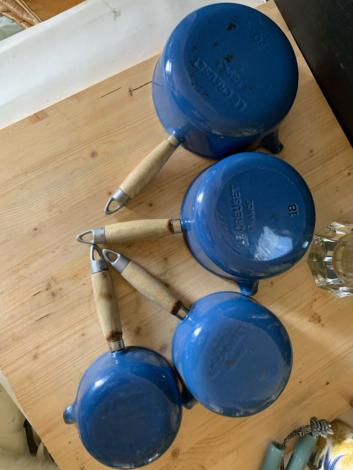 Series of cast iron pans Le Creuset bleues