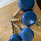 Series of cast iron pans Le Creuset bleues