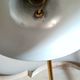 50's 50's green metal articulated desk lamp and golden flexible foot