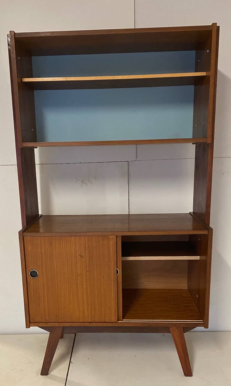 Vintage bookcase with compass feet from the 60s