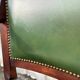 Paire de fauteuils de style Empire en acajou et cuir vert
