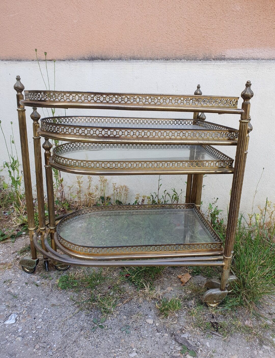 Set of nesting brass and glass serving trolleys
