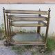 Set of nesting brass and glass serving trolleys