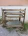 Set of nesting brass and glass serving trolleys