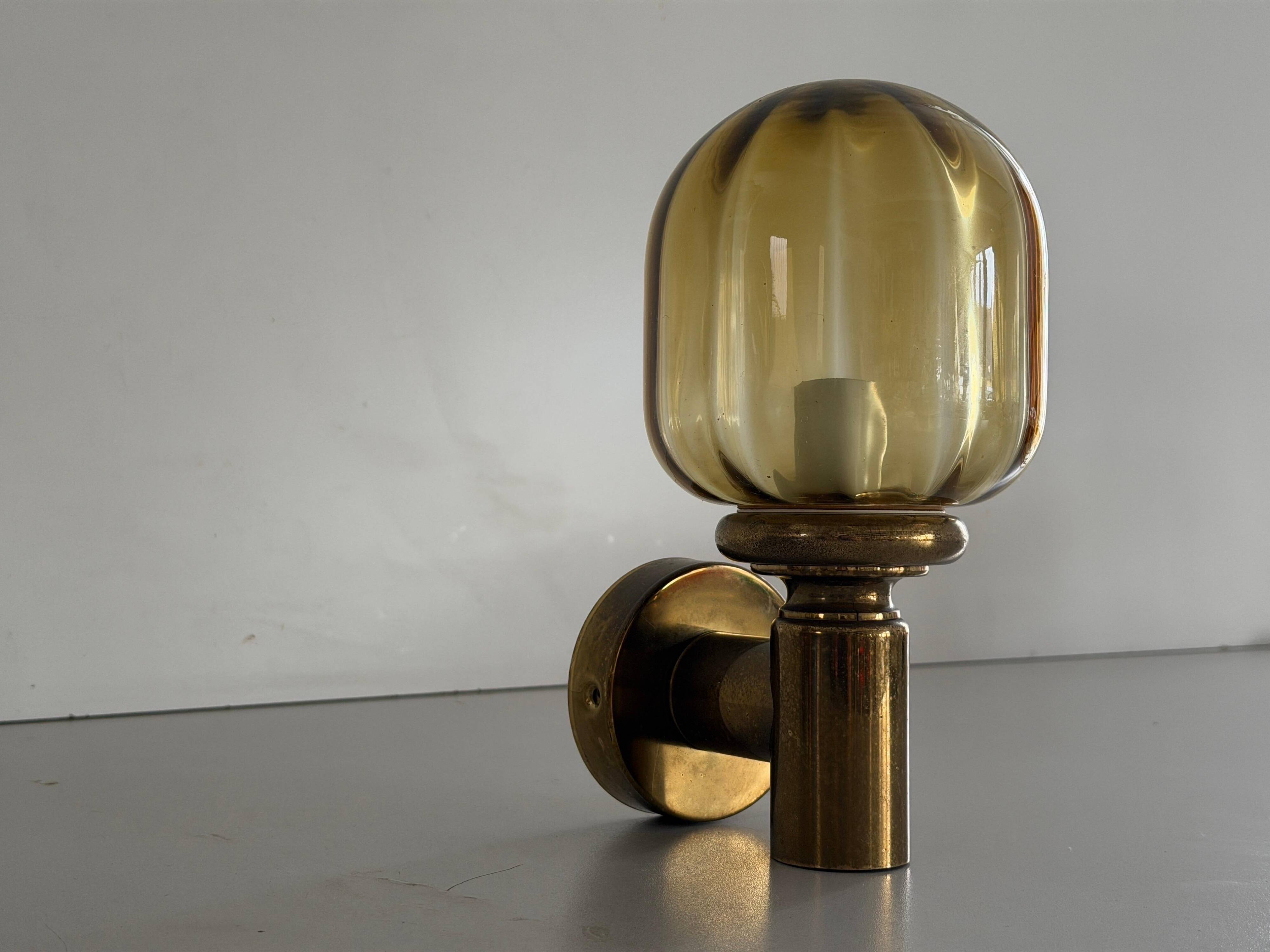 Pair of yellow glass and brass wall lights from the mid-century by N Leuchten, 1960s, Germany.