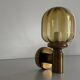 Pair of yellow glass and brass wall lights from the mid-century by N Leuchten, 1960s, Germany.