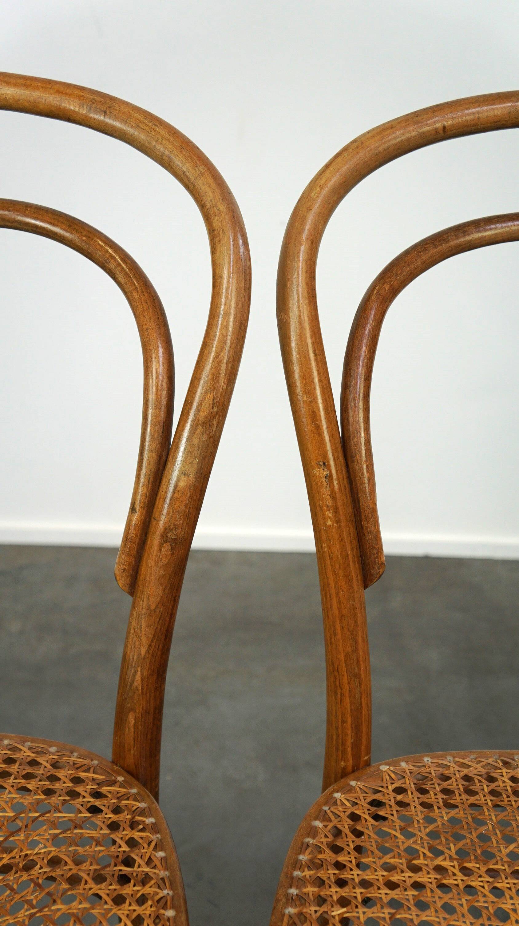 Lovely set of 2 brown vintage bistro chairs with woven seats