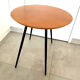 1970s coffee table in honey beech with black steel legs.