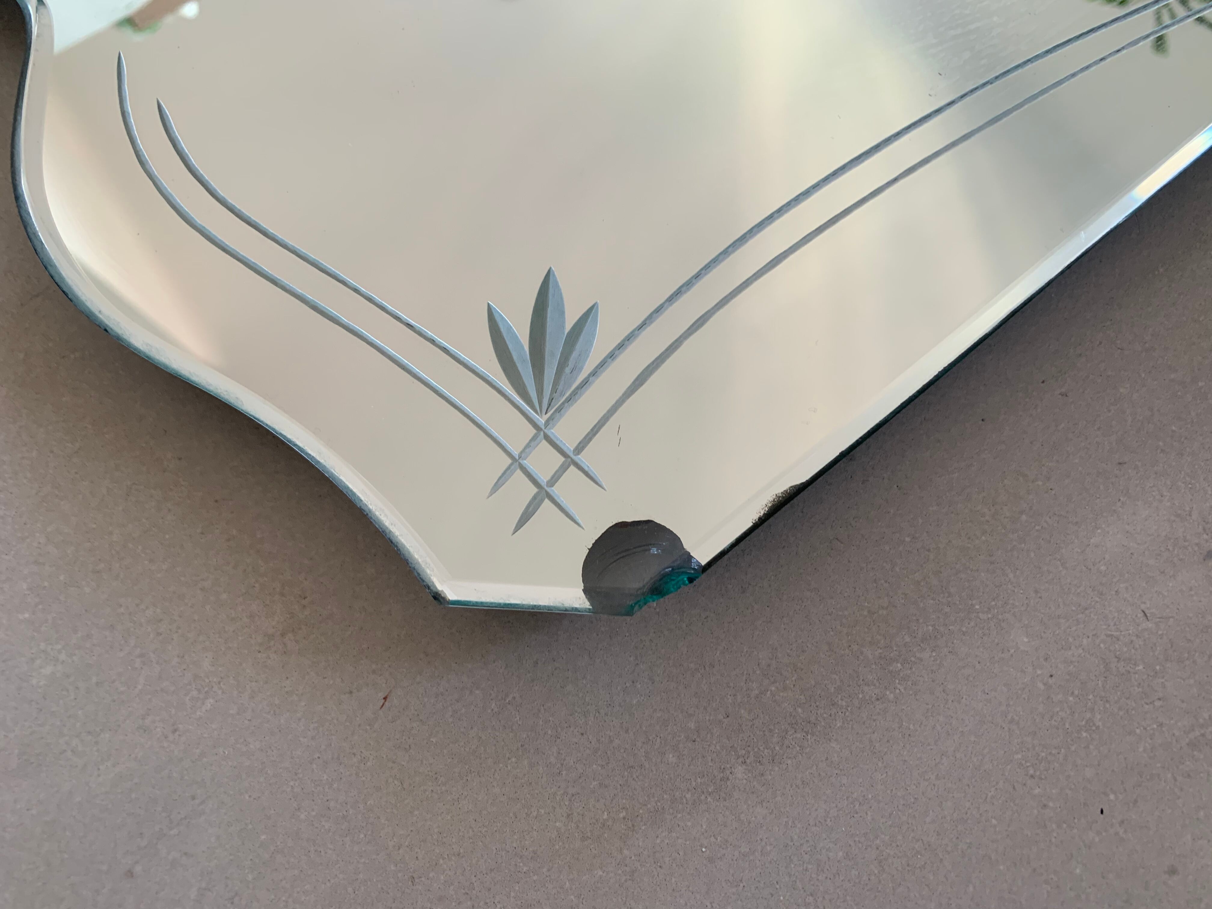 Bevelled and chiseled Venetian mirror  - 54x35cm