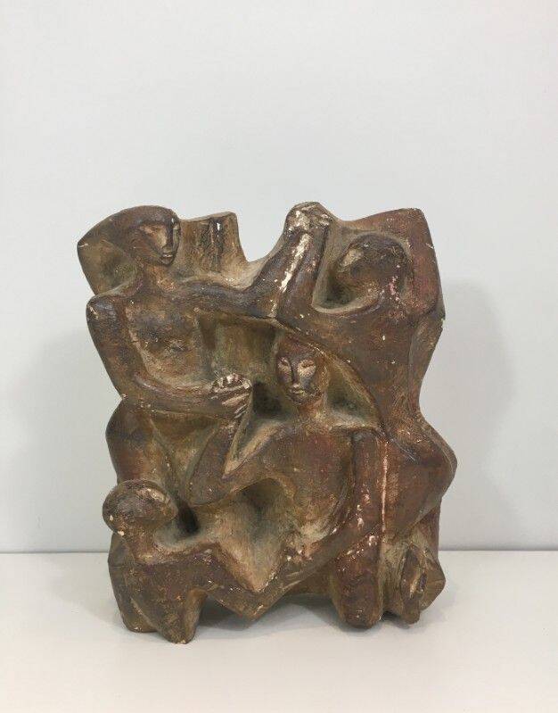 Plaster sculpture depicting a group of 3 figures