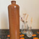 Vintage MKT ocher stoneware bottle