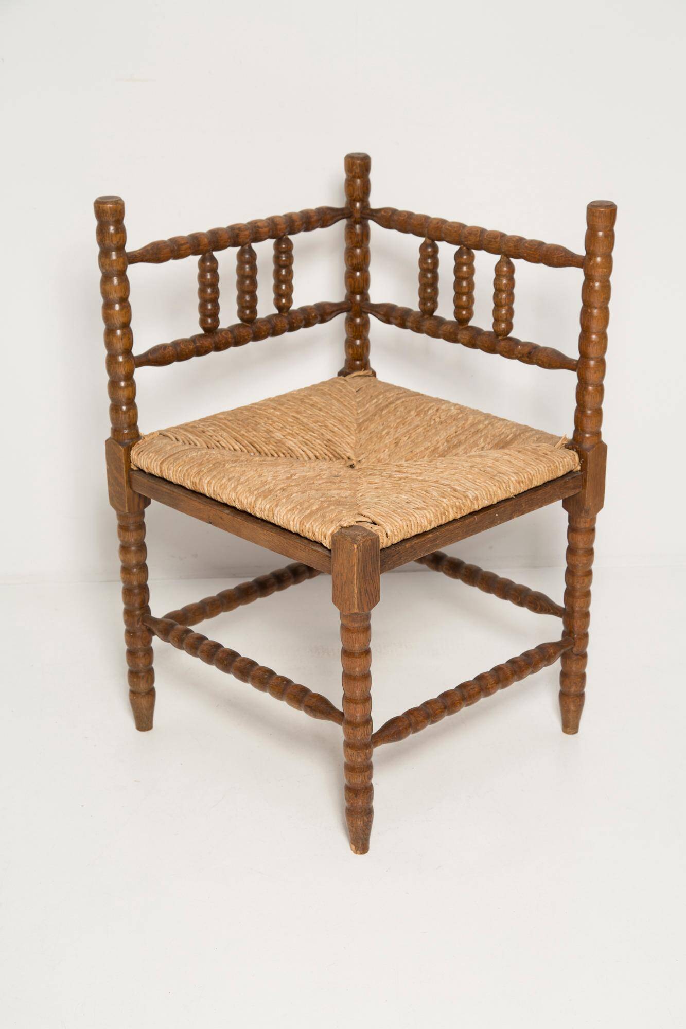 Mid-century provincial antique bobbin corner chair, France, 1940s.