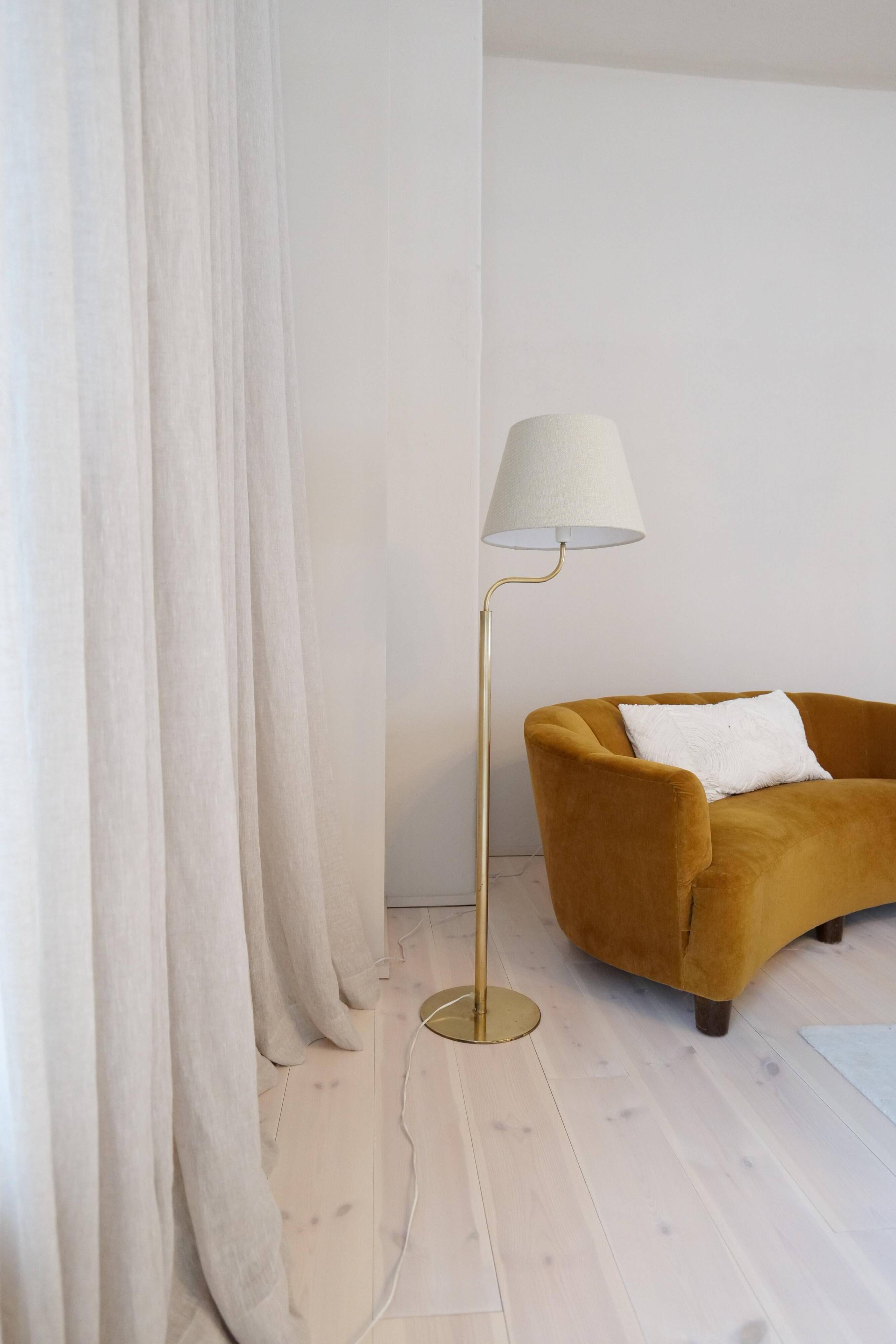 Sculptural modern brass floor lamps from the mid-century Luxus, Sweden, 1970s.