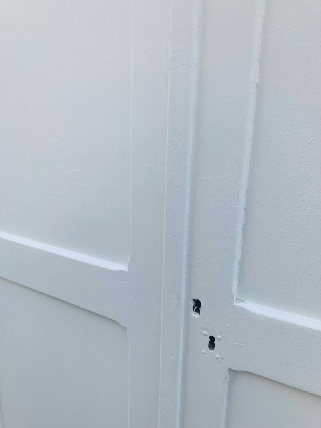 Antique white Parisian wardrobe with Majorelle blue interior