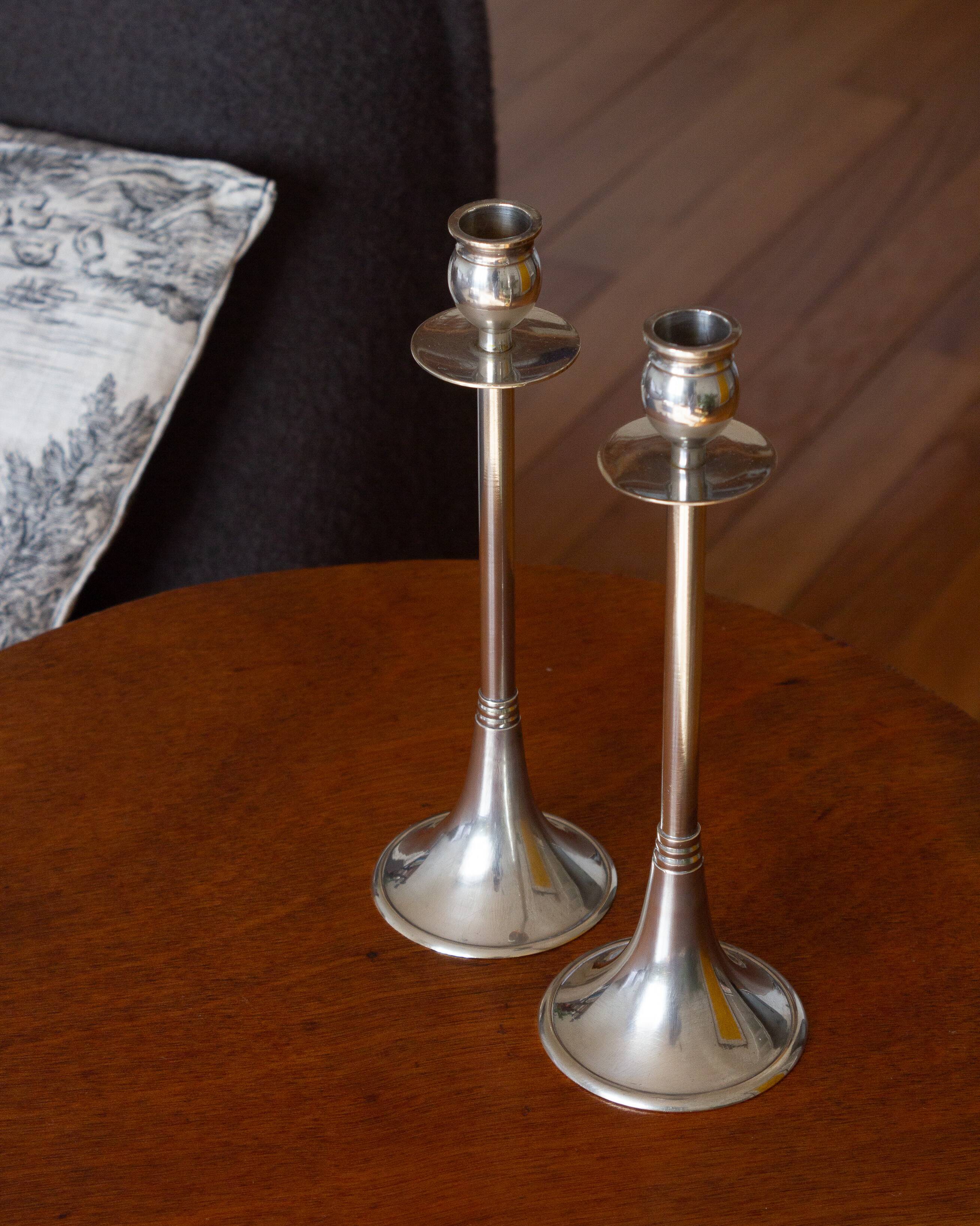 Duo of silver-plated brass candlesticks, 1950s/1960s