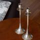 Duo of silver-plated brass candlesticks, 1950s/1960s