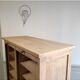 Antique furniture with double curtains sanded to white
