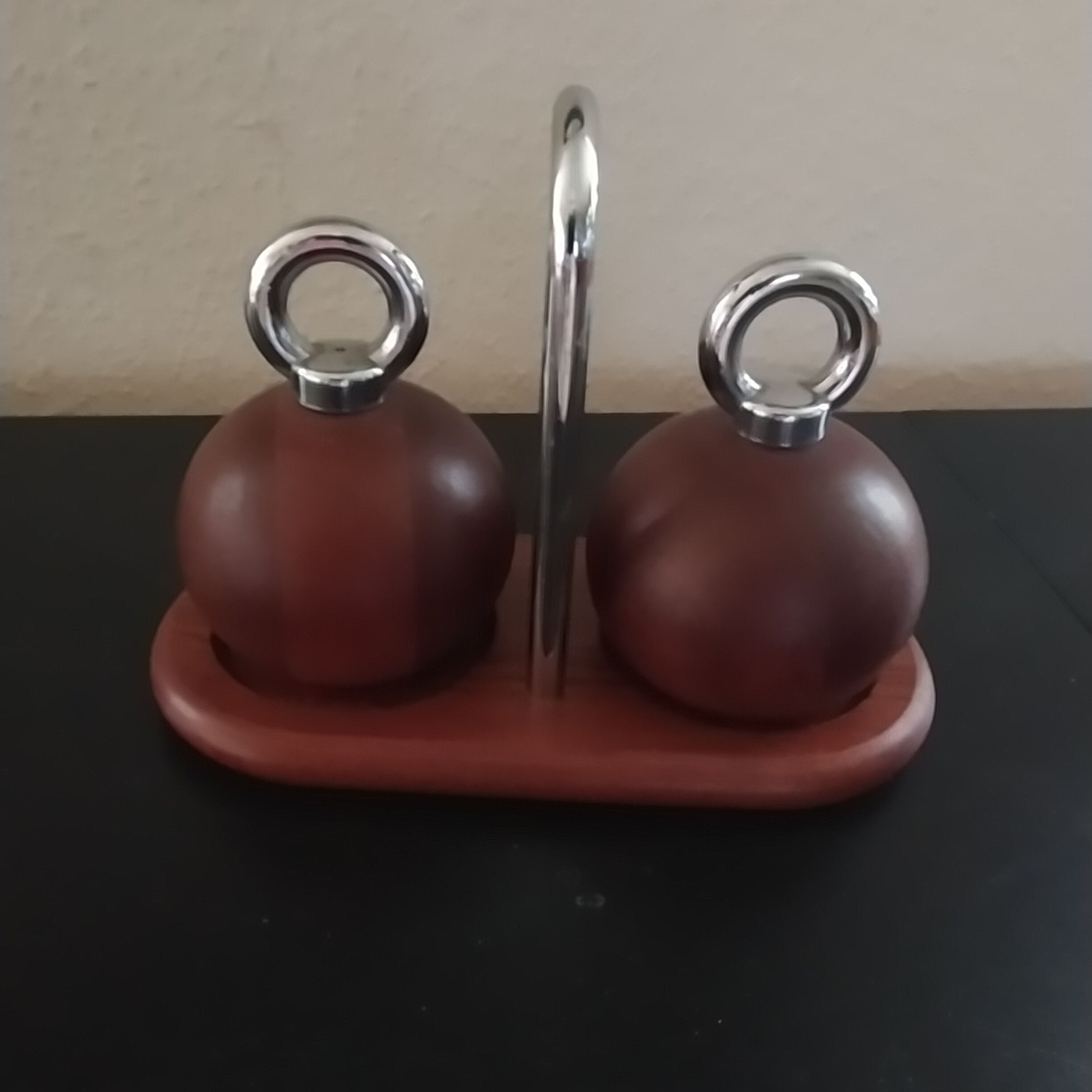 Salt and pepper mill set on base