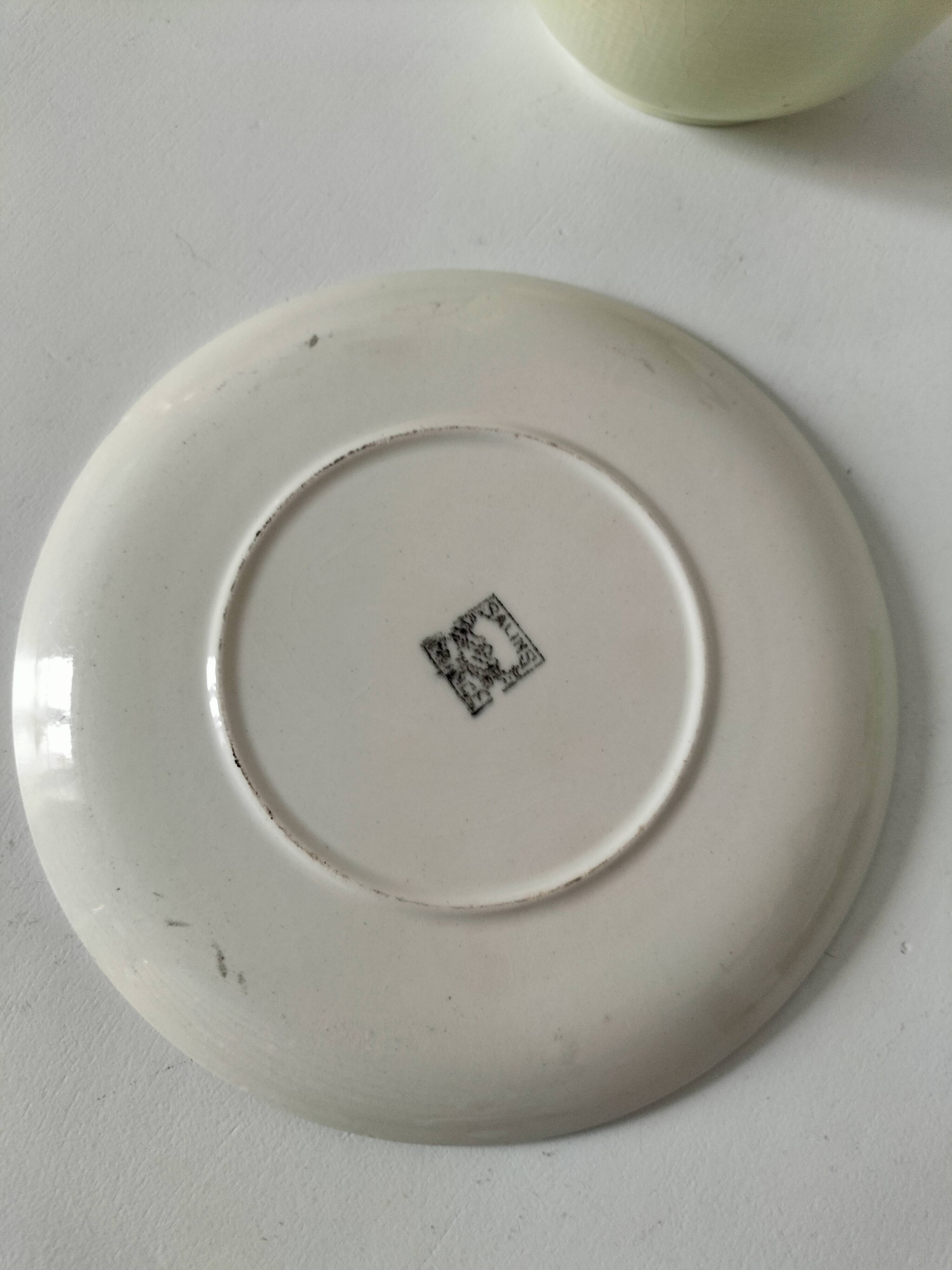 Two sugar bowls and a textured plate in turquoise and green Salins earthenware.