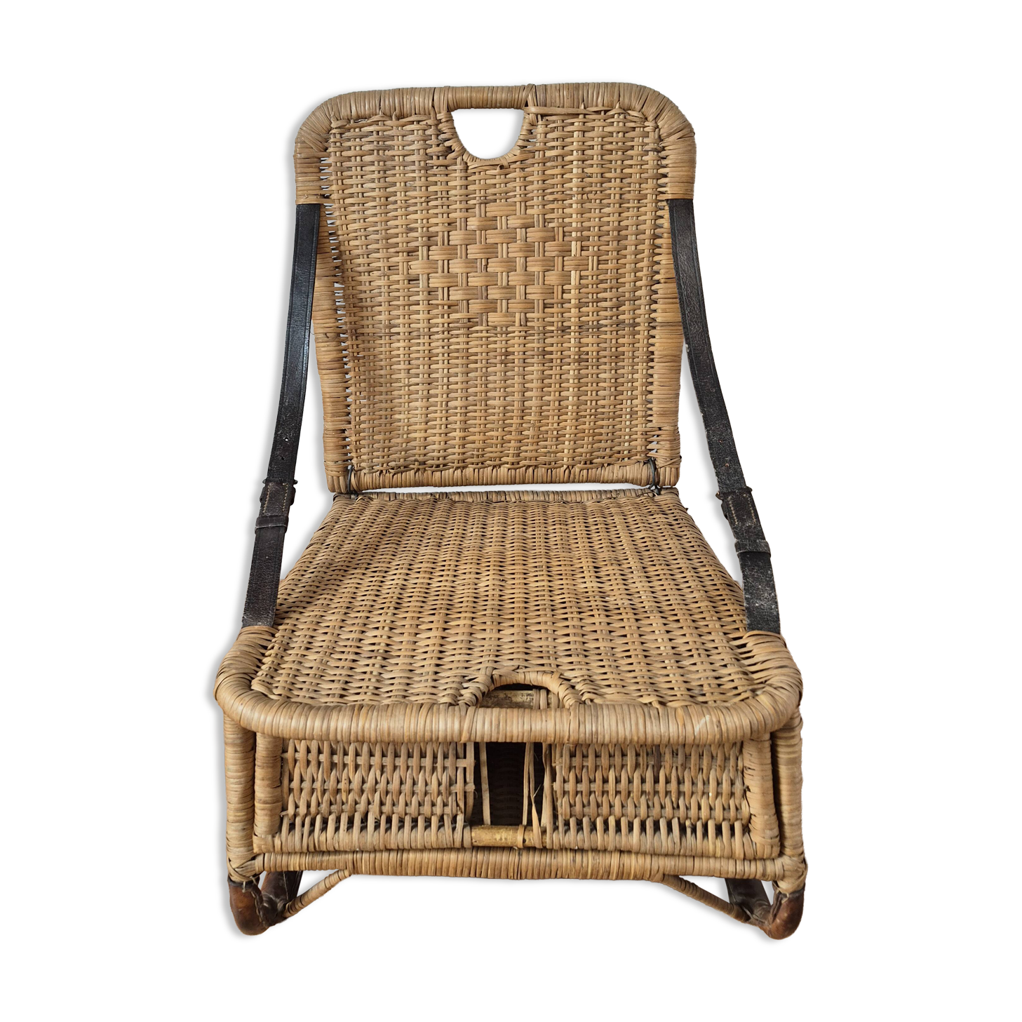 Vintage foldable beach chair, picnic in rattan and leather.
