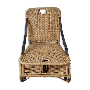 Vintage foldable beach chair, picnic in rattan and leather.