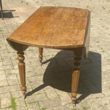 Wooden table on casters
