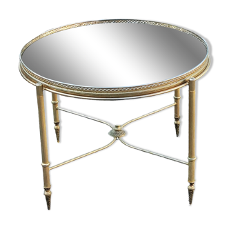 Round neoclassical style coffee table in gilded brass and smoked glass from the 70s