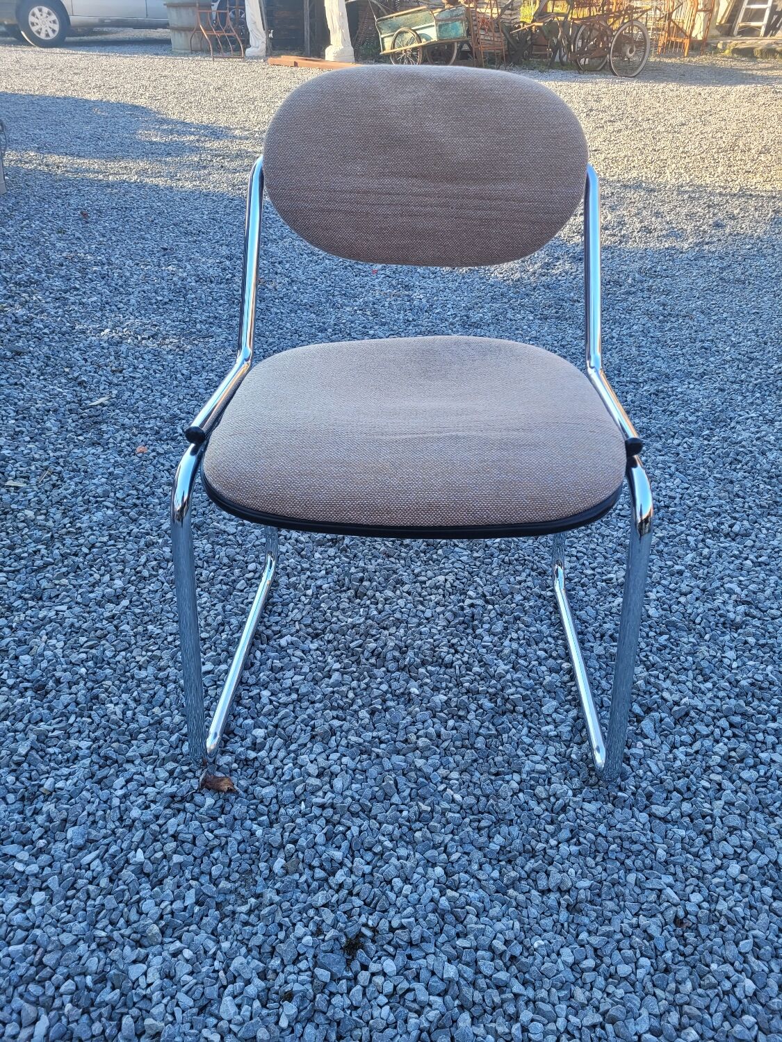 Vintage office chair with chrome base and fabric top
