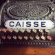 "caisse" enamelled trade plate.