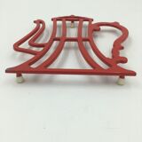cast iron underside in the shape of a coffee maker