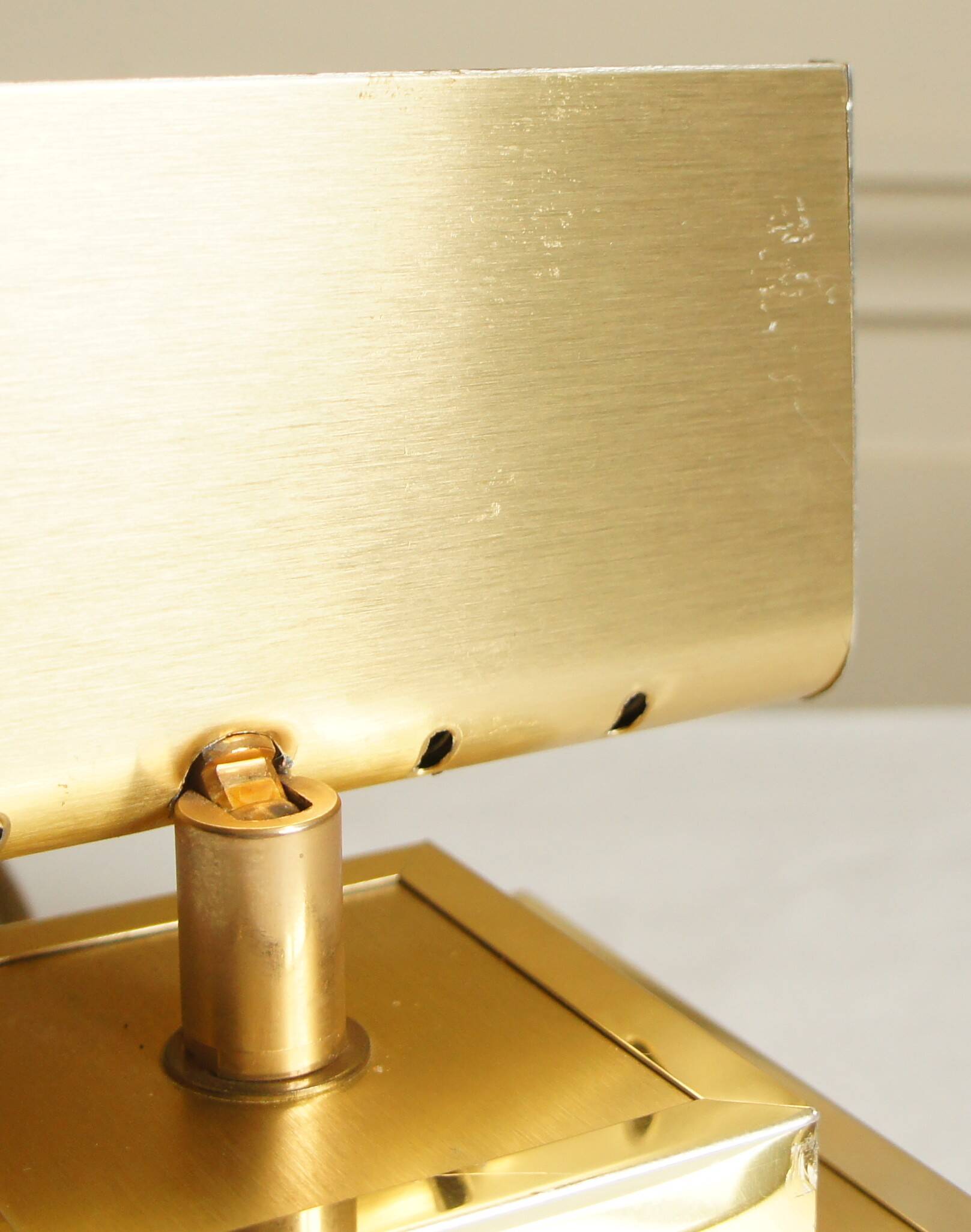 Hollywood Regency articulated lamp/wall lamp in golden brass