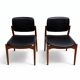 Captain chair pair by Erik Buch