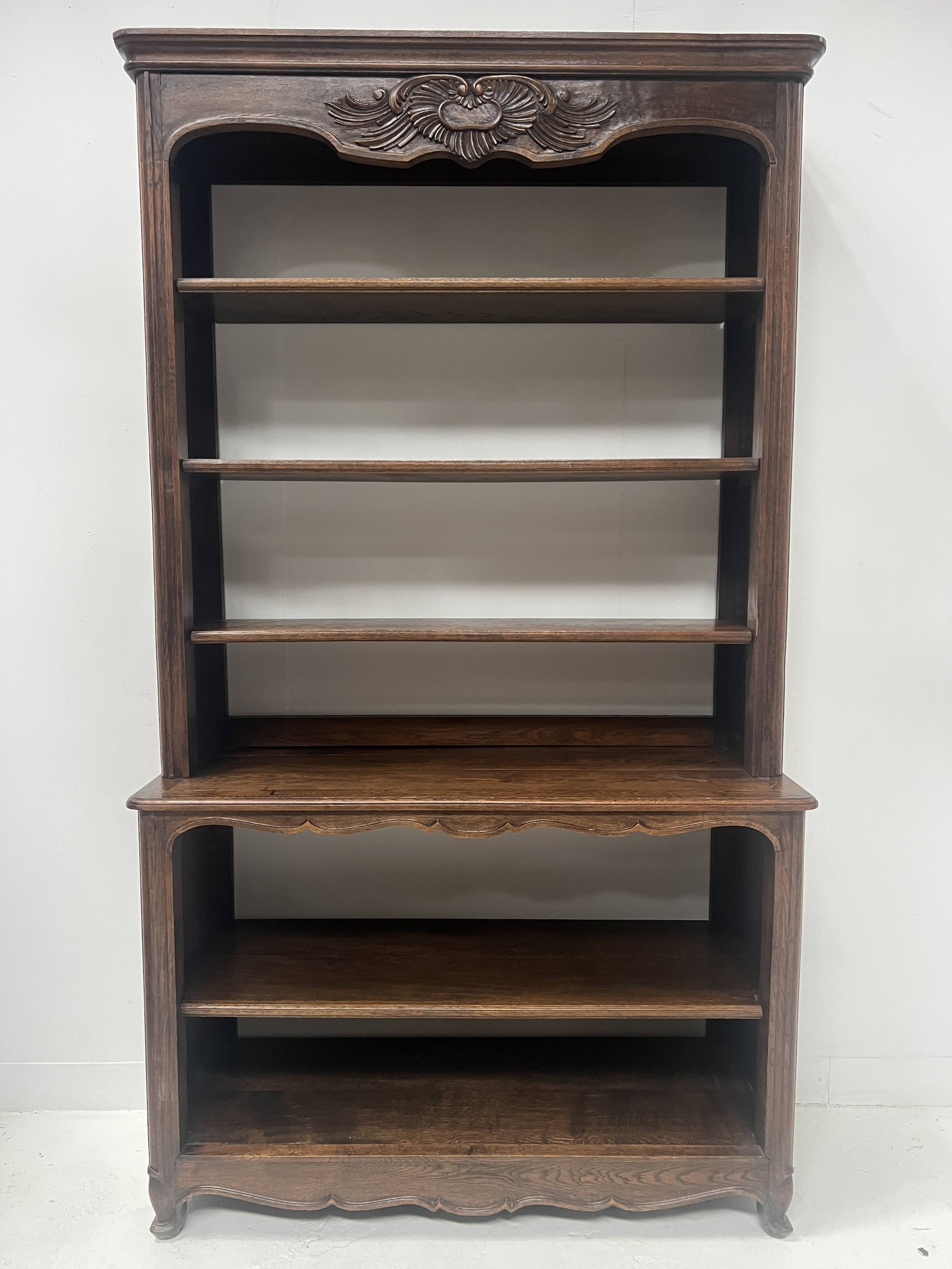 Wall library in two sections in Louis XV style made of solid oak, 20th century.