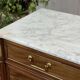 Louis XVI commode in mahogany with a marble top from the 1950s.