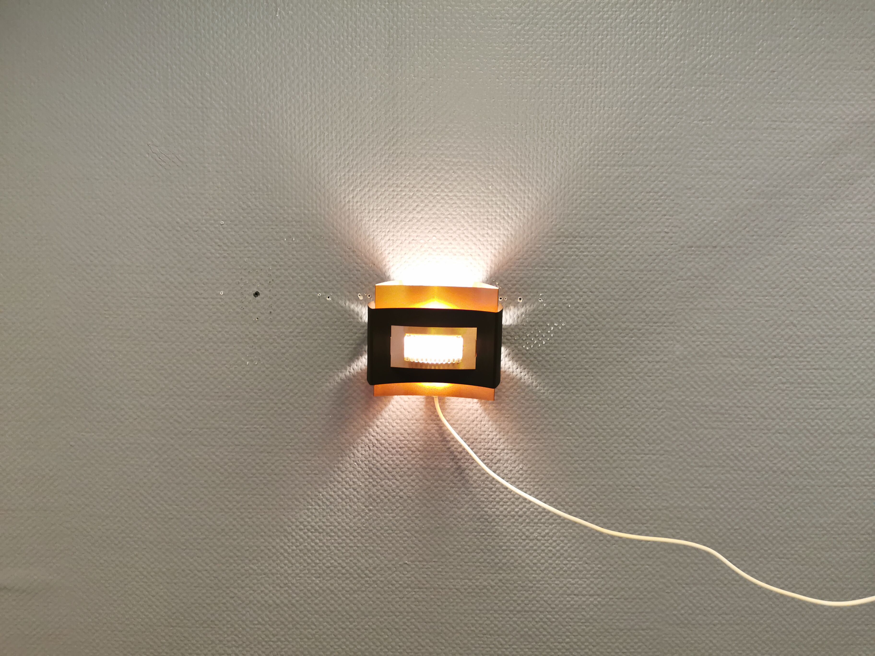 Wall lamp, designed by Werner Schou for his own company Coronell Elektro - Denmark.