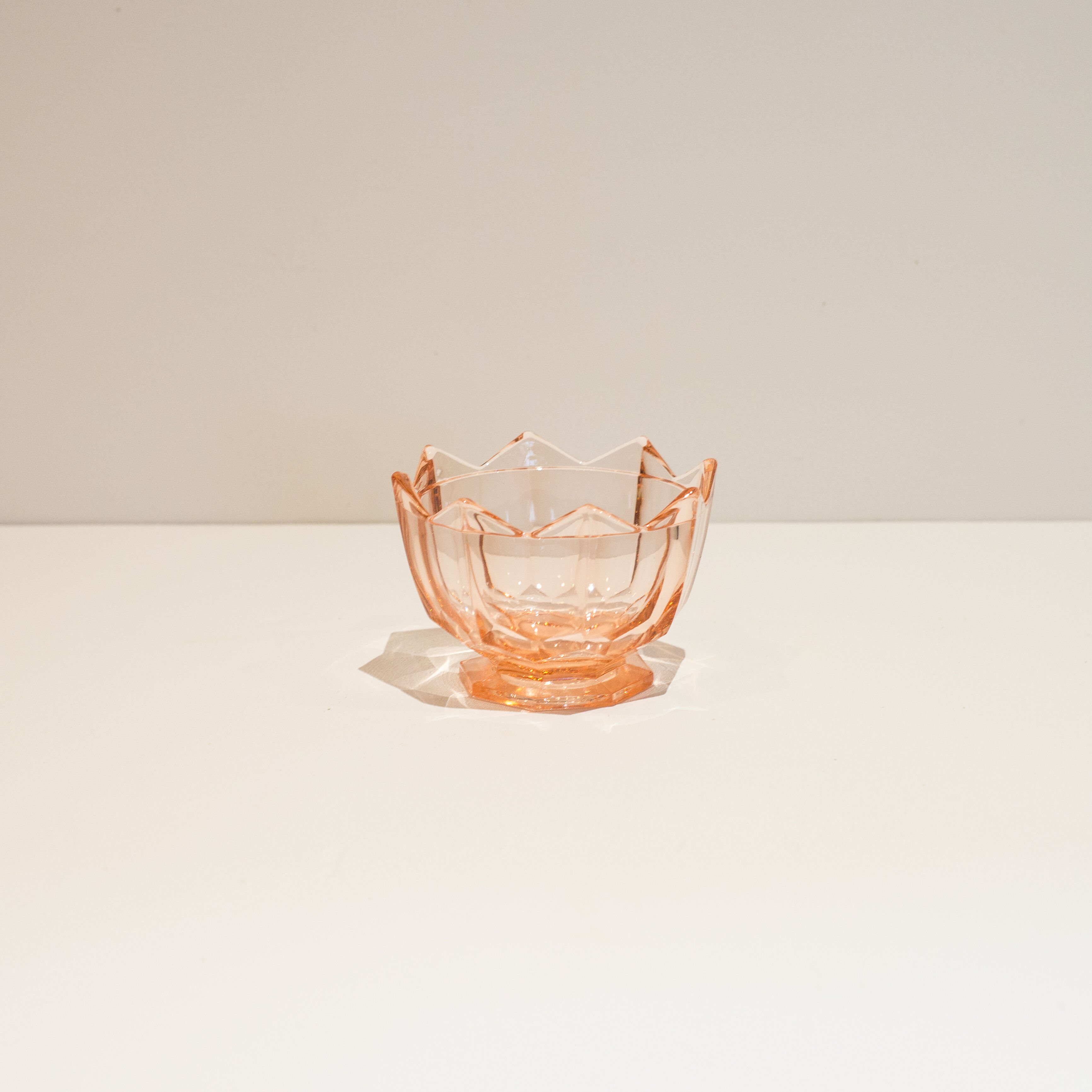 Empty pink glass jar pocket