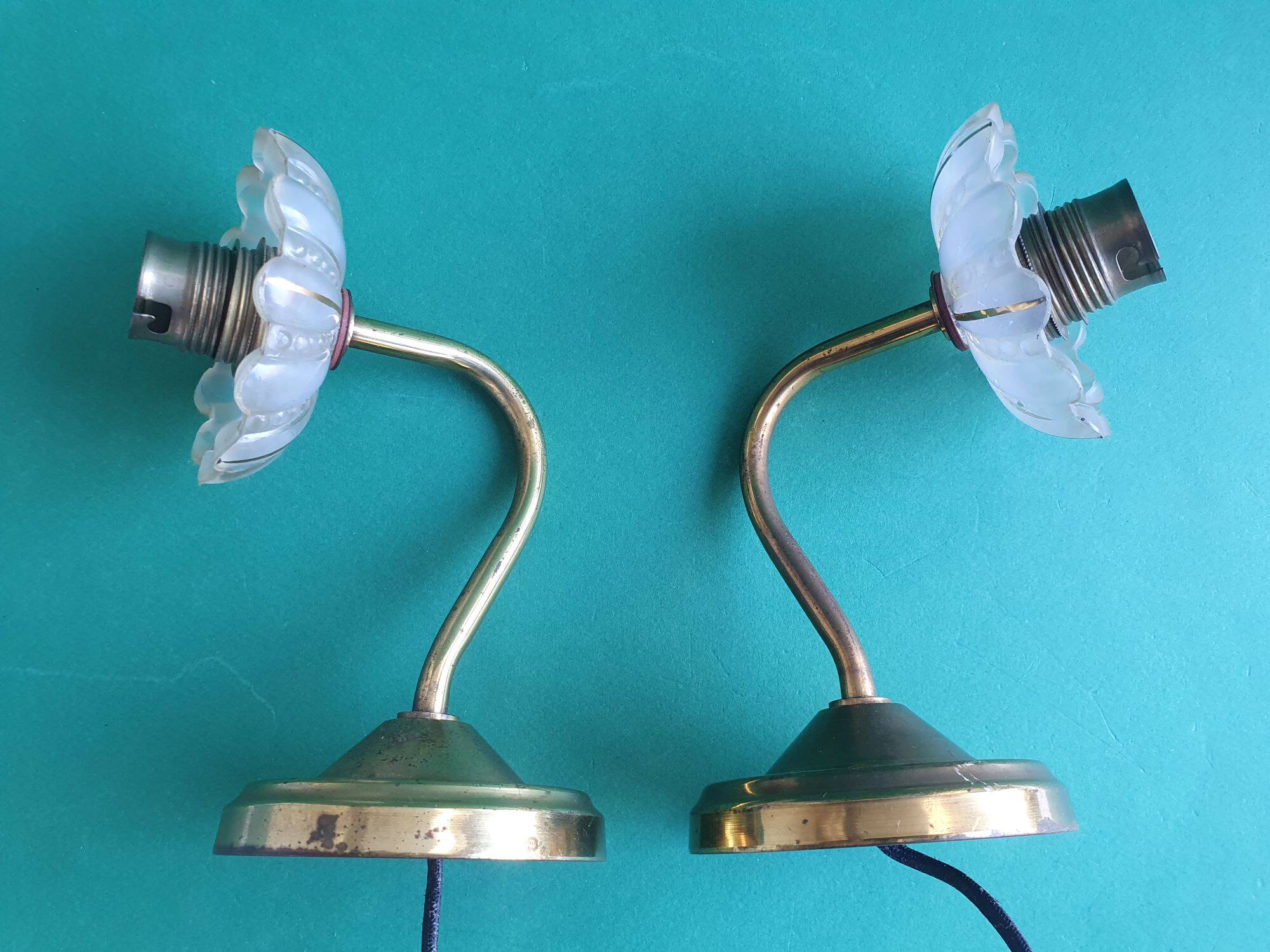 Pair of antique gold candlestick wall sconces