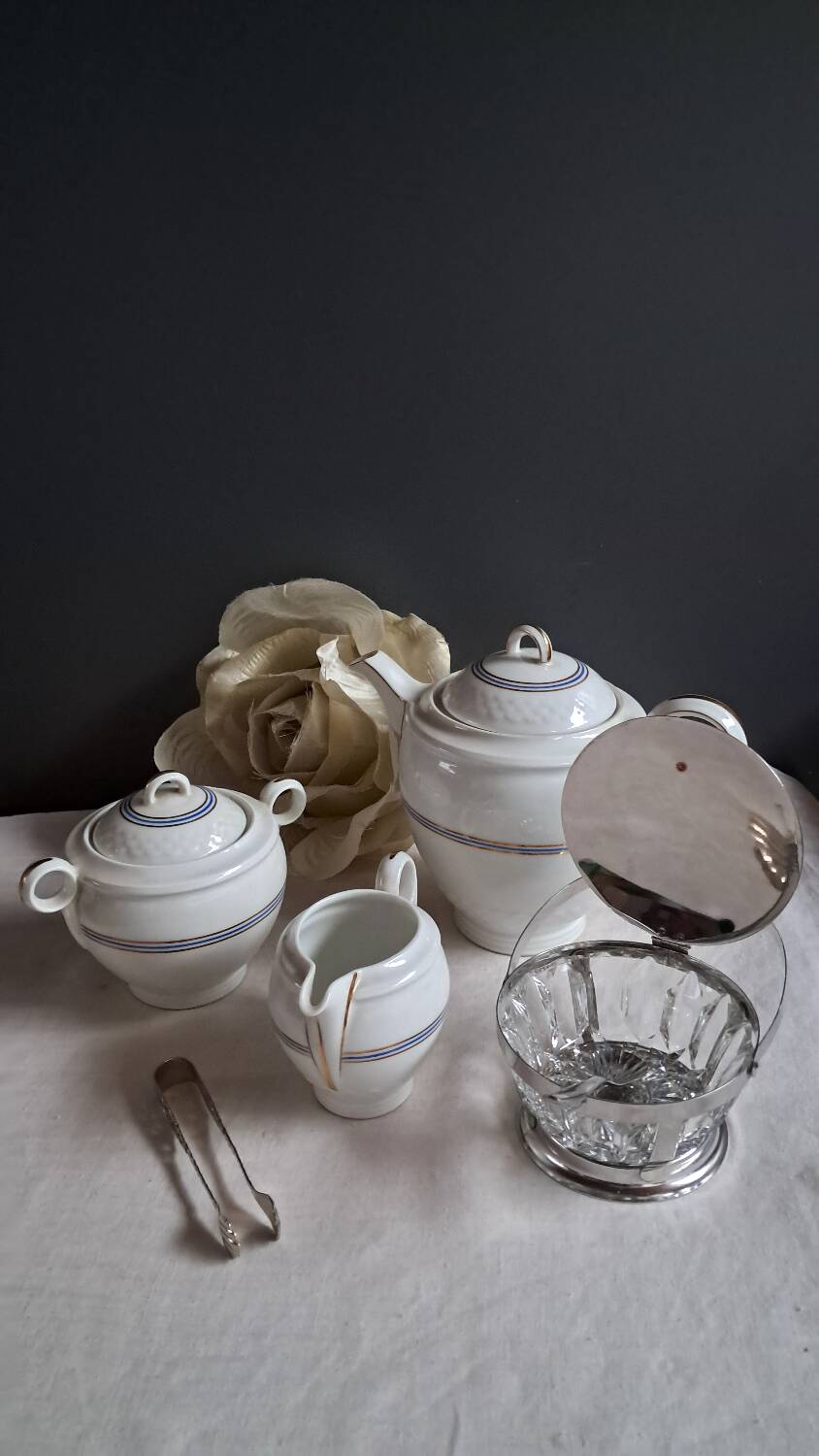 Teapot, sugar bowl, milk jug, jam jar.