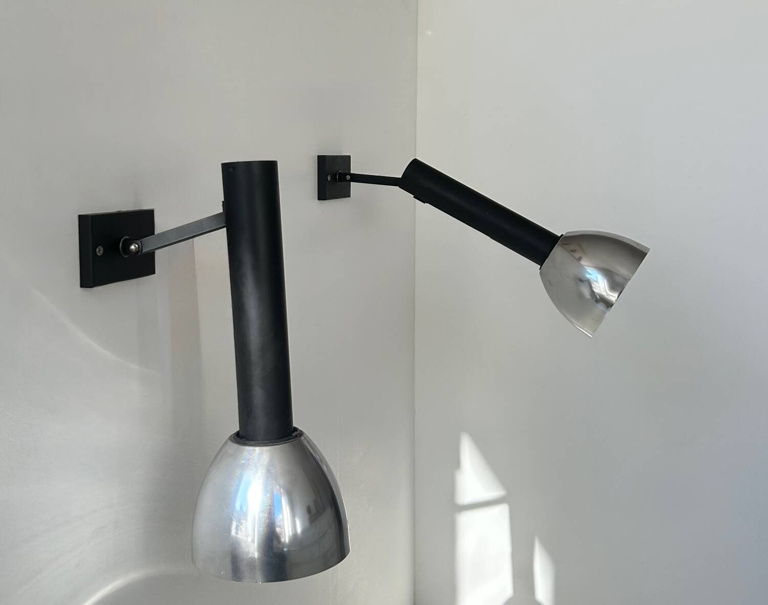 Pair of vintage wall lights, chrome and matte black metal, France 1960