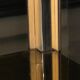 Hollywood Regency style bookcase shelf, gilded brass and black lacquered wood, 1970