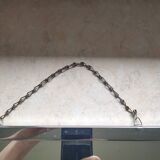 Barber mirror with chain.