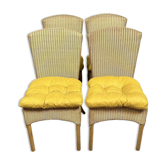 Series of 4 rattan chairs loom furniture B.V with cushions circa 1980-1990