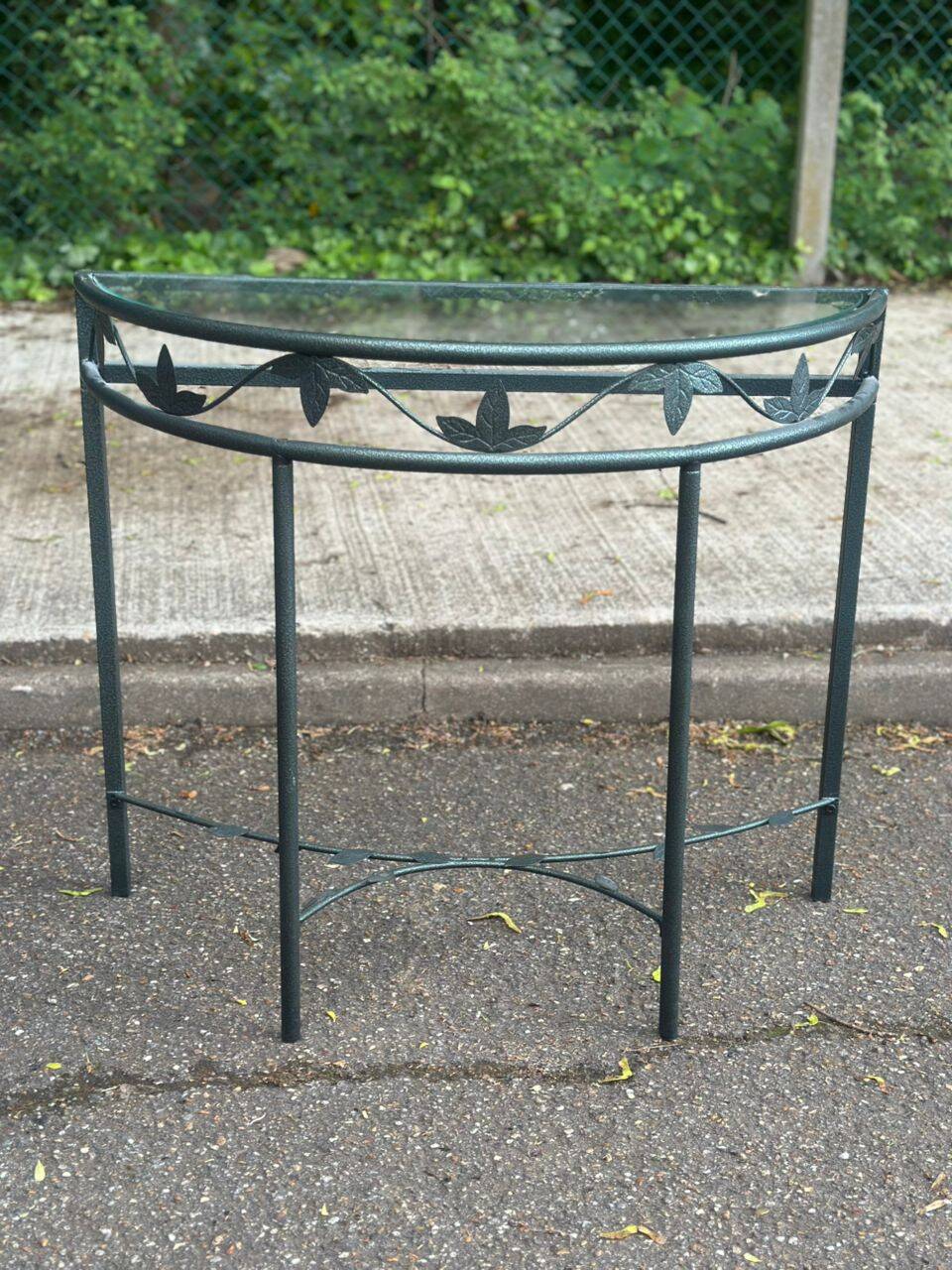 Grey-green wrought iron half-moon console with glass, 85cm.